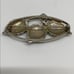 Vintage silver toned three leaf brooch