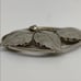 Vintage silver toned three leaf brooch