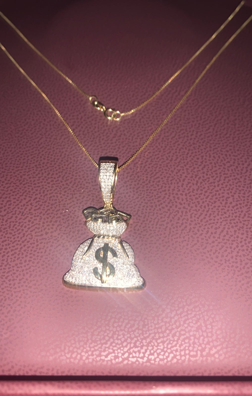 Money bag diamond pendant