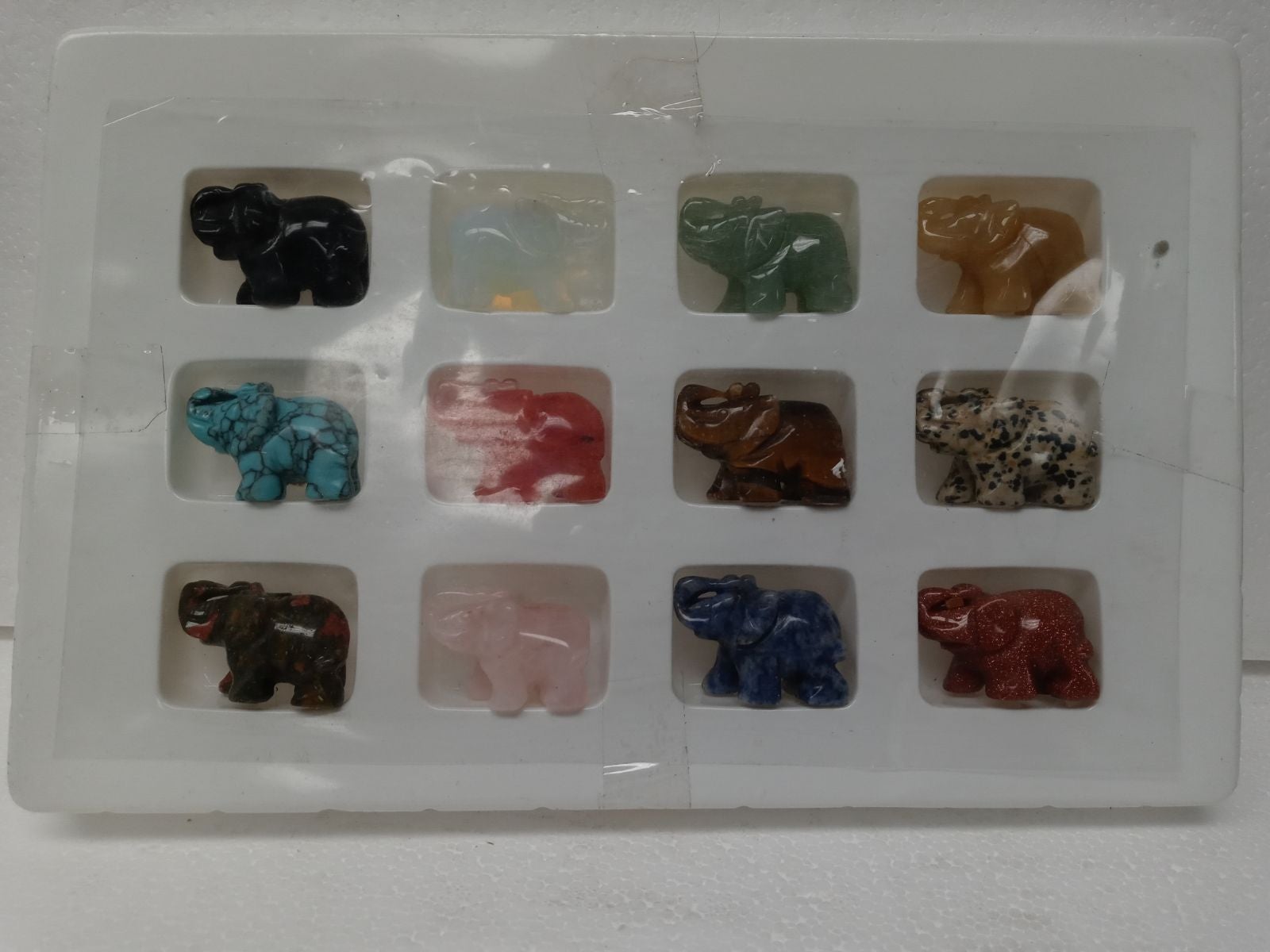 Semi precious stone elephant 12pcs.