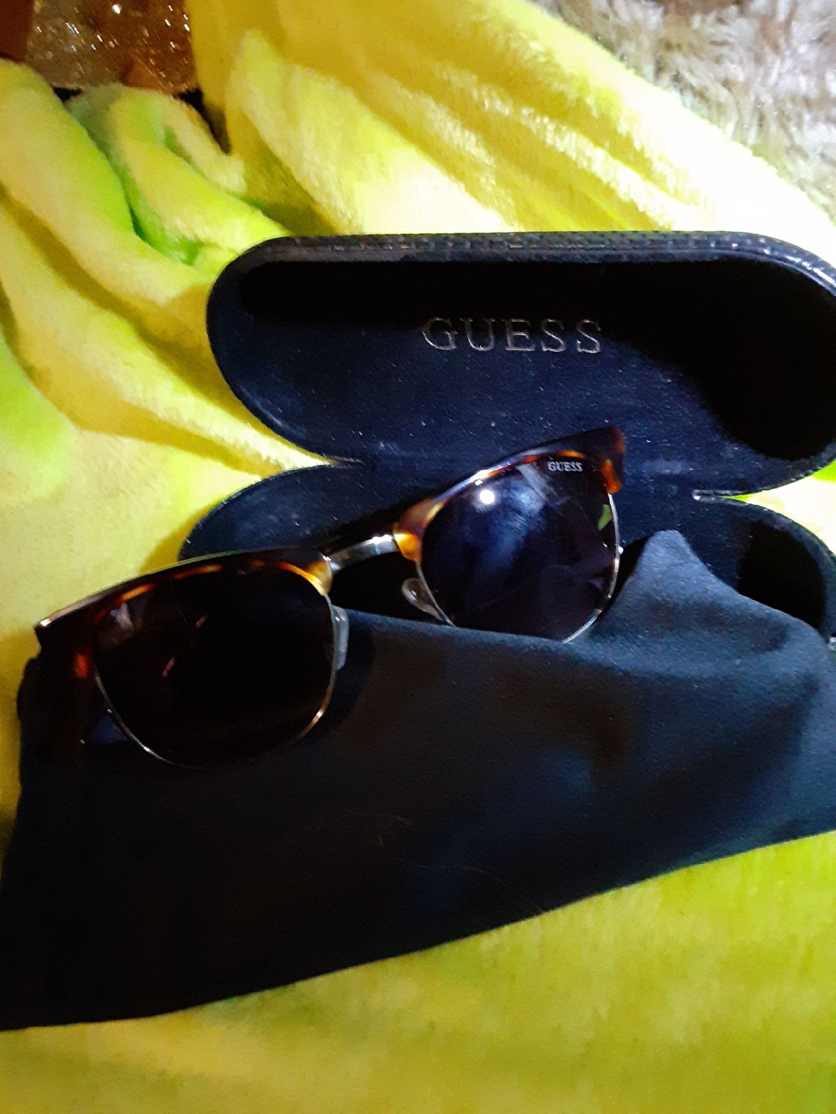 Sunglasses by Guess