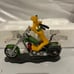 Howing it Up Pluto on Motorcycle