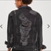 Distressed denim jacket