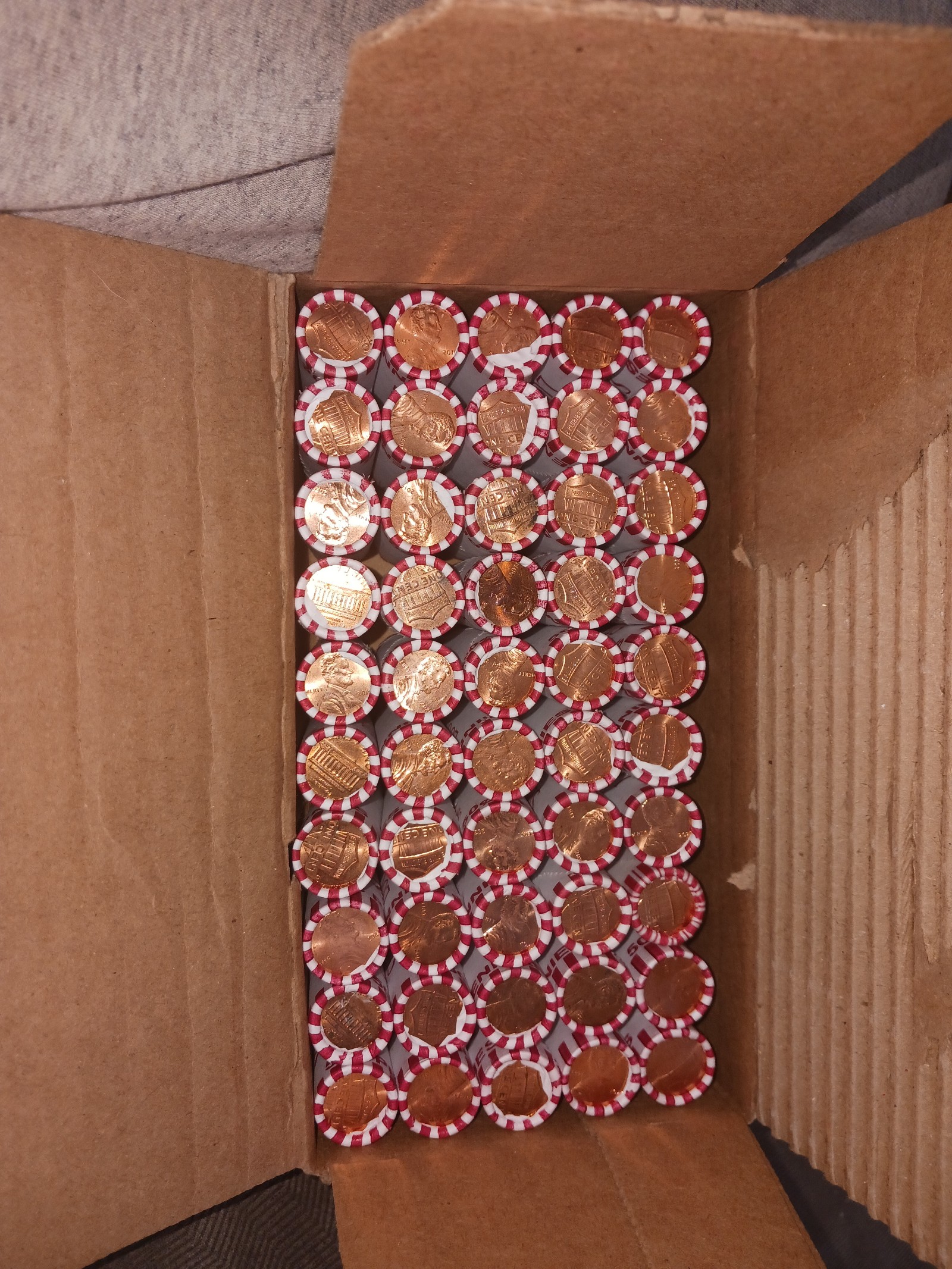 Bank box penny rolls Loomis  wrapped 50 cents - detail
