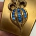 Vintage Golden Blue Rhinestone Stylized Fleur-de-lis Mirror Powder Compact