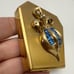 Vintage Golden Blue Rhinestone Stylized Fleur-de-lis Mirror Powder Compact