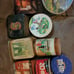 Vintage Tin Canisters, Coca-Cola tray, Coca-Cola picture, and a glass tea jar.