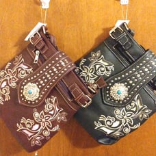 Action Imports women's messenger bag
