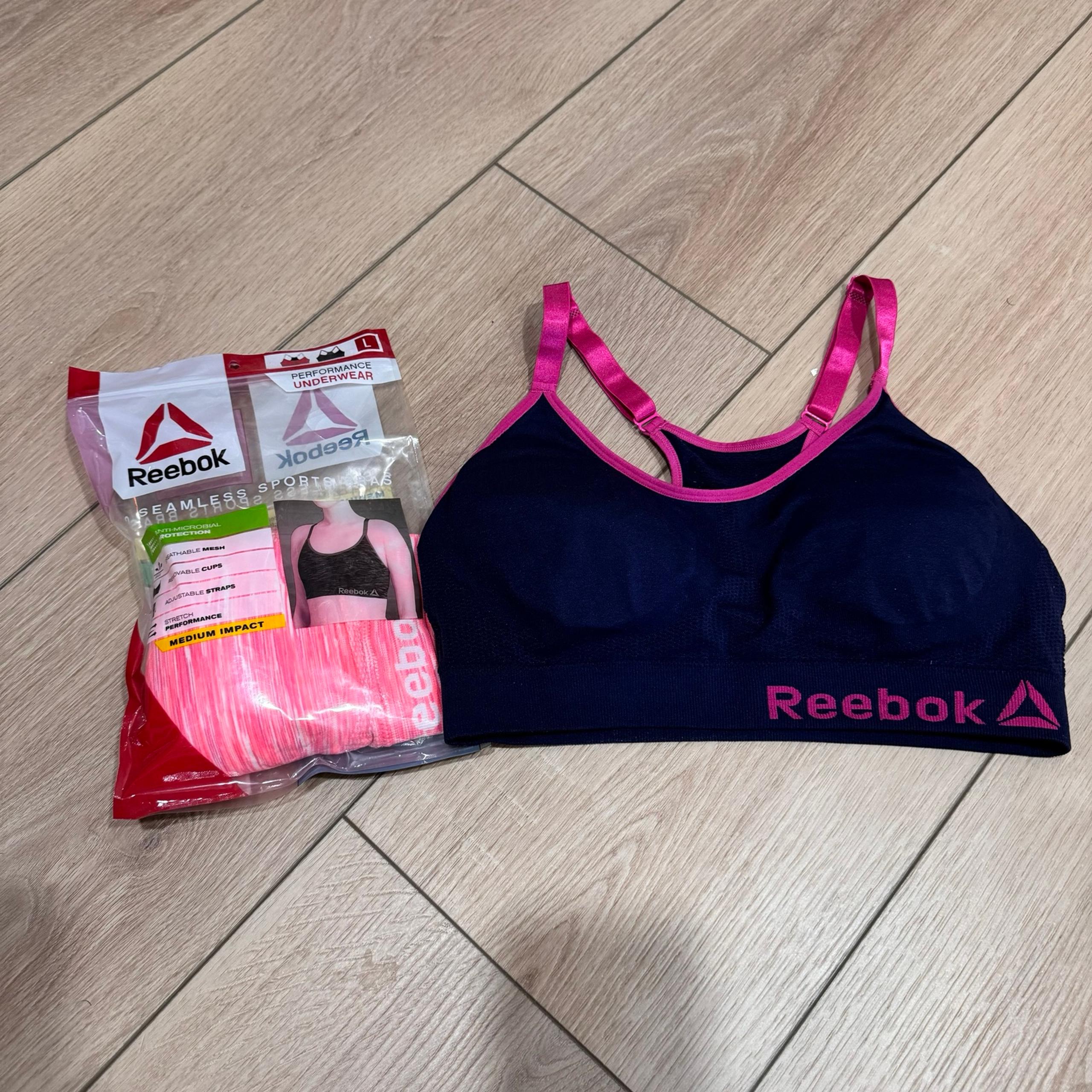 Reebok lot of 2 sports bras L medium impact adjustable women’s exercise workout