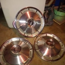 3-14 Oldsmobile Delta 88 hubcaps