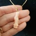Carved angelskin coral geisha lady pendant gold tone chain necklace