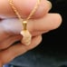 Carved angelskin coral geisha lady pendant gold tone chain necklace
