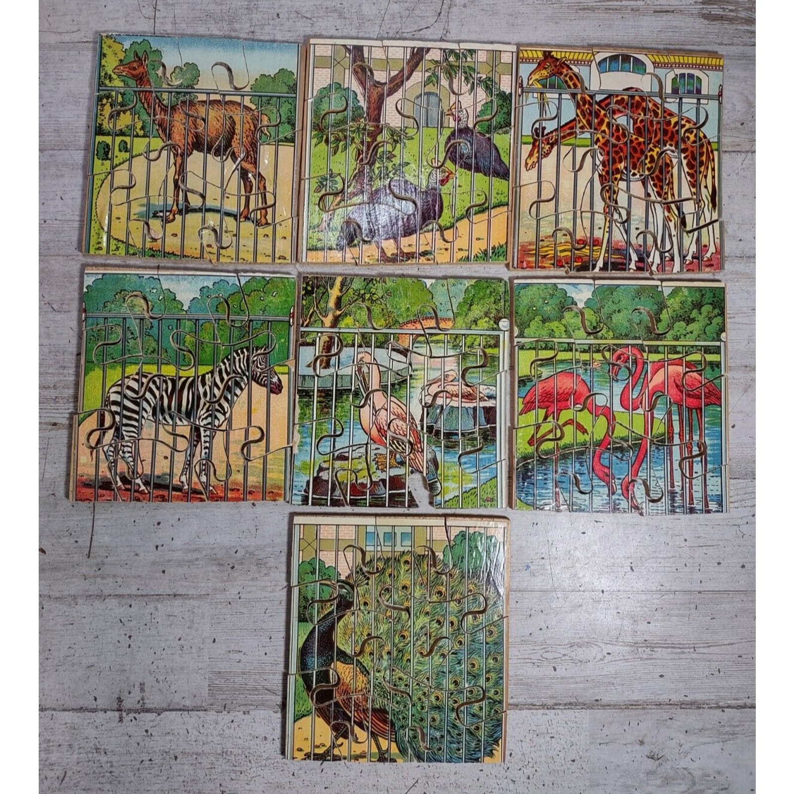 Lot of 7 Antique Wood Chromolithograph Zoo Animal Jigsaw Puzzles Giraffe Zebra