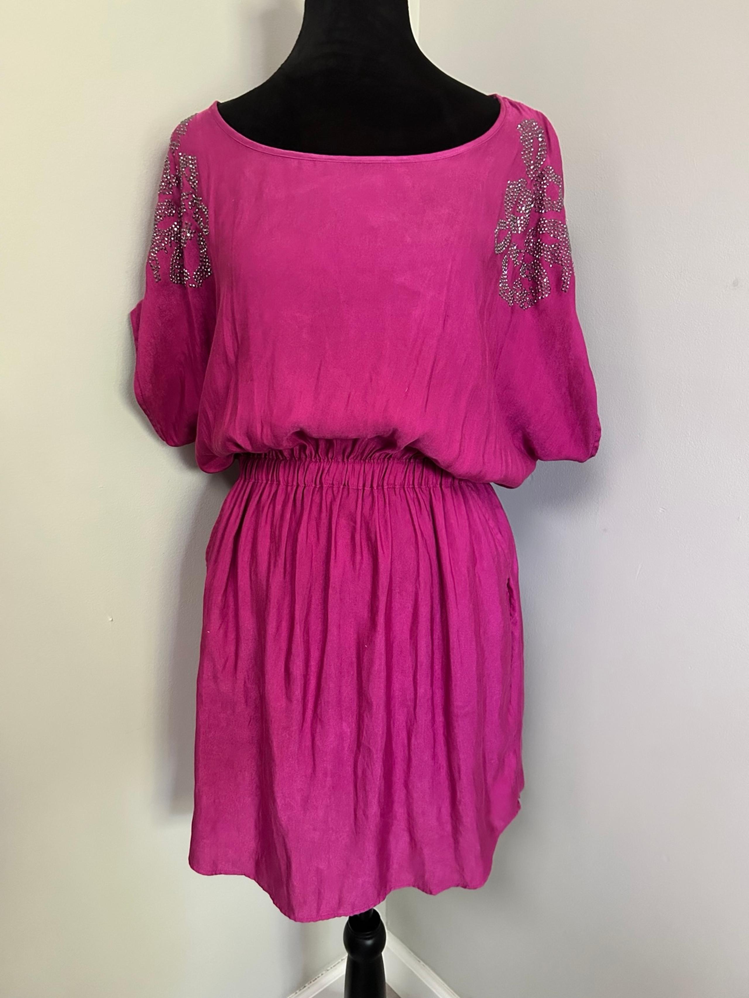 Express Fuchsia with dark gray bejeweled sleeves