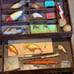 Vintage fishing lures and tackle in a Metal Kenndy tackle box!