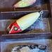 Vintage fishing lures and tackle in a Metal Kenndy tackle box!
