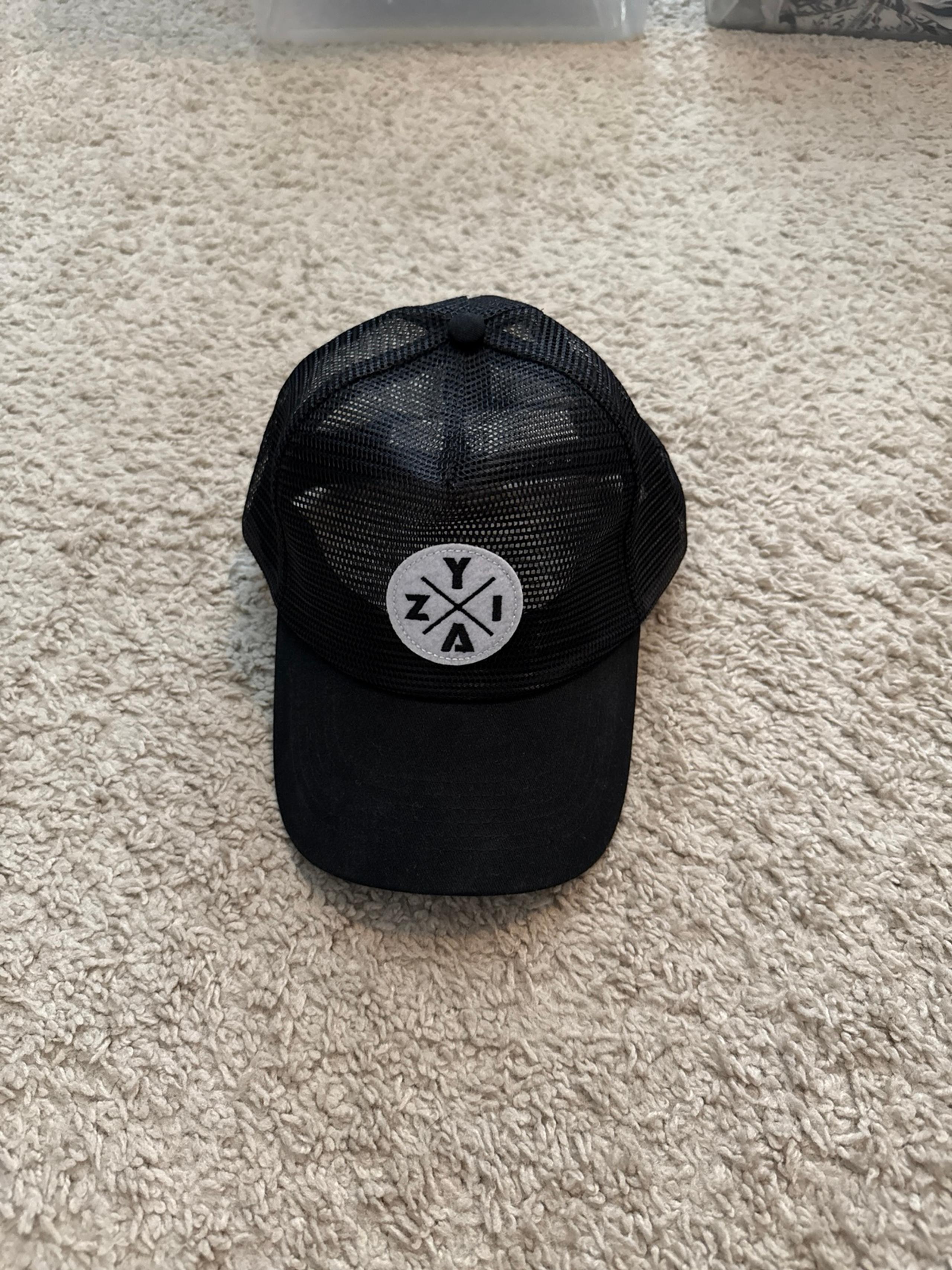 NWOT Black Zyia Trucker Hat
