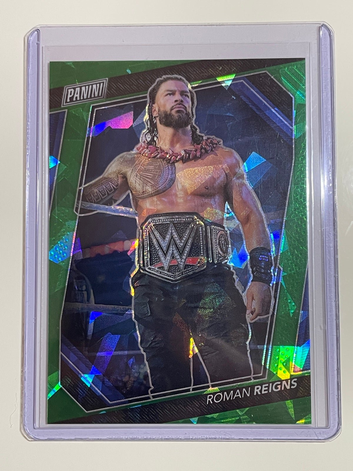 2023 Panini The National VIP Roman Reigns #61 Green Cracked Ice Prizm /99