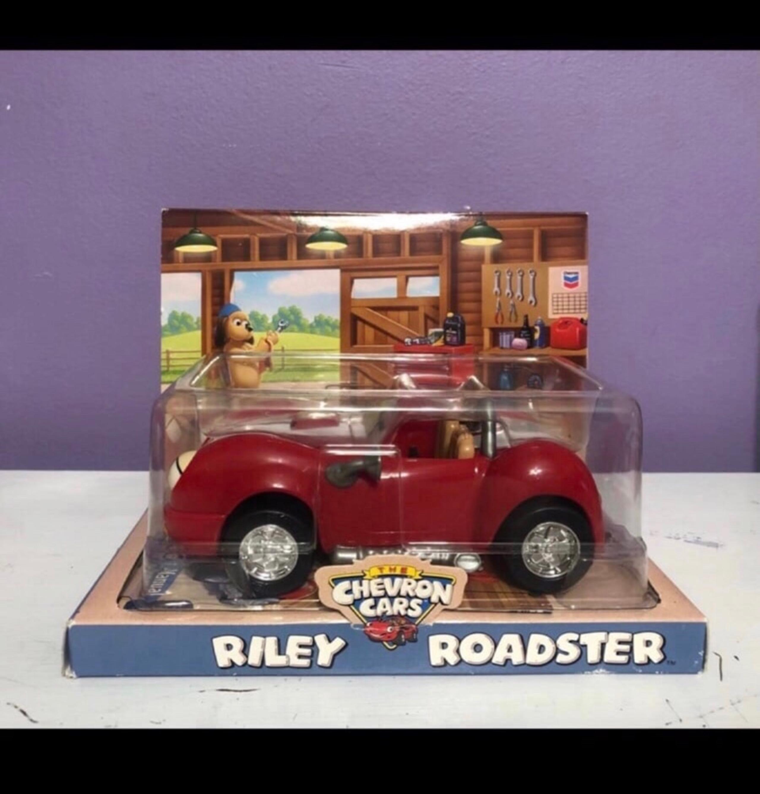 2003 vintage Red vehicle Riley Roadster Chevron