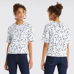 DRAPER JAMES | Denim Floral Printed Ruffle Hem Popover Blouse