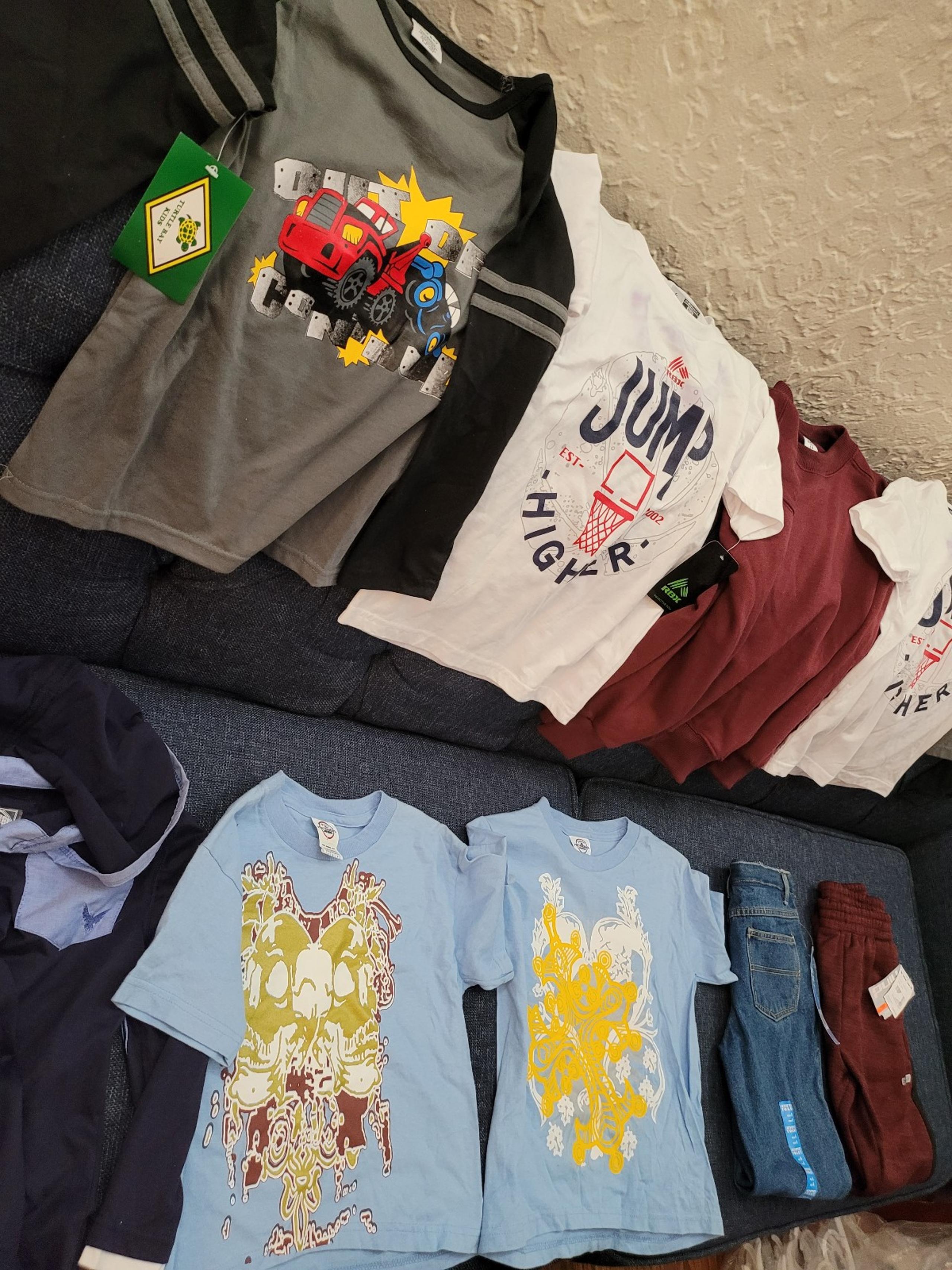 9 Pieces Of Boys Clothing - 7 Boys Shirts And  2 Pairs Of Pants Brand New w/tags