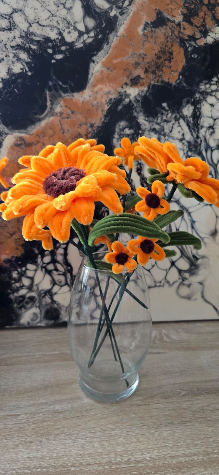 A handmade sunflower bouquet crafted from fuzzy wire.
