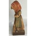 vintage hand carved lady sweeping wood figures made in Italy