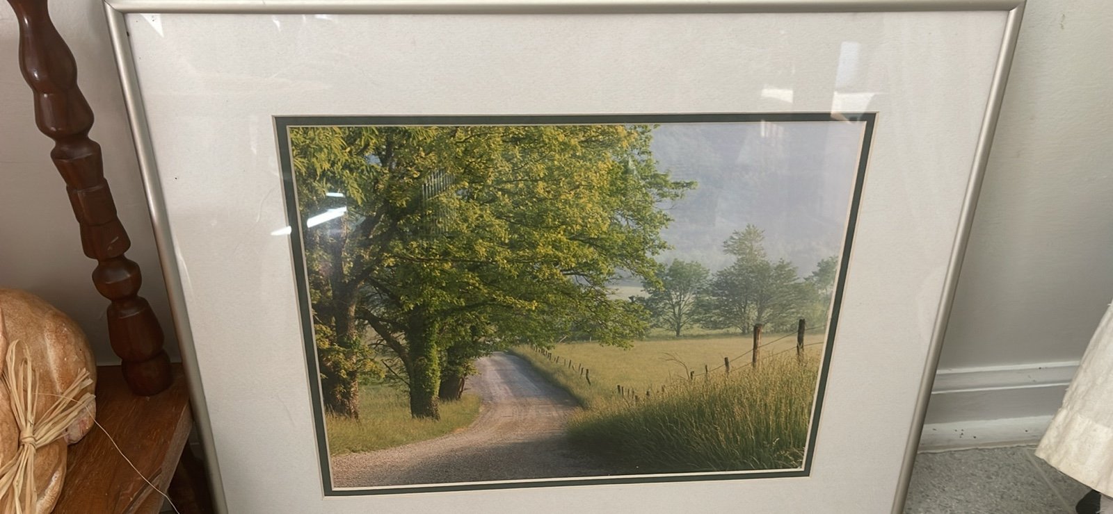 print of a scenic country road.