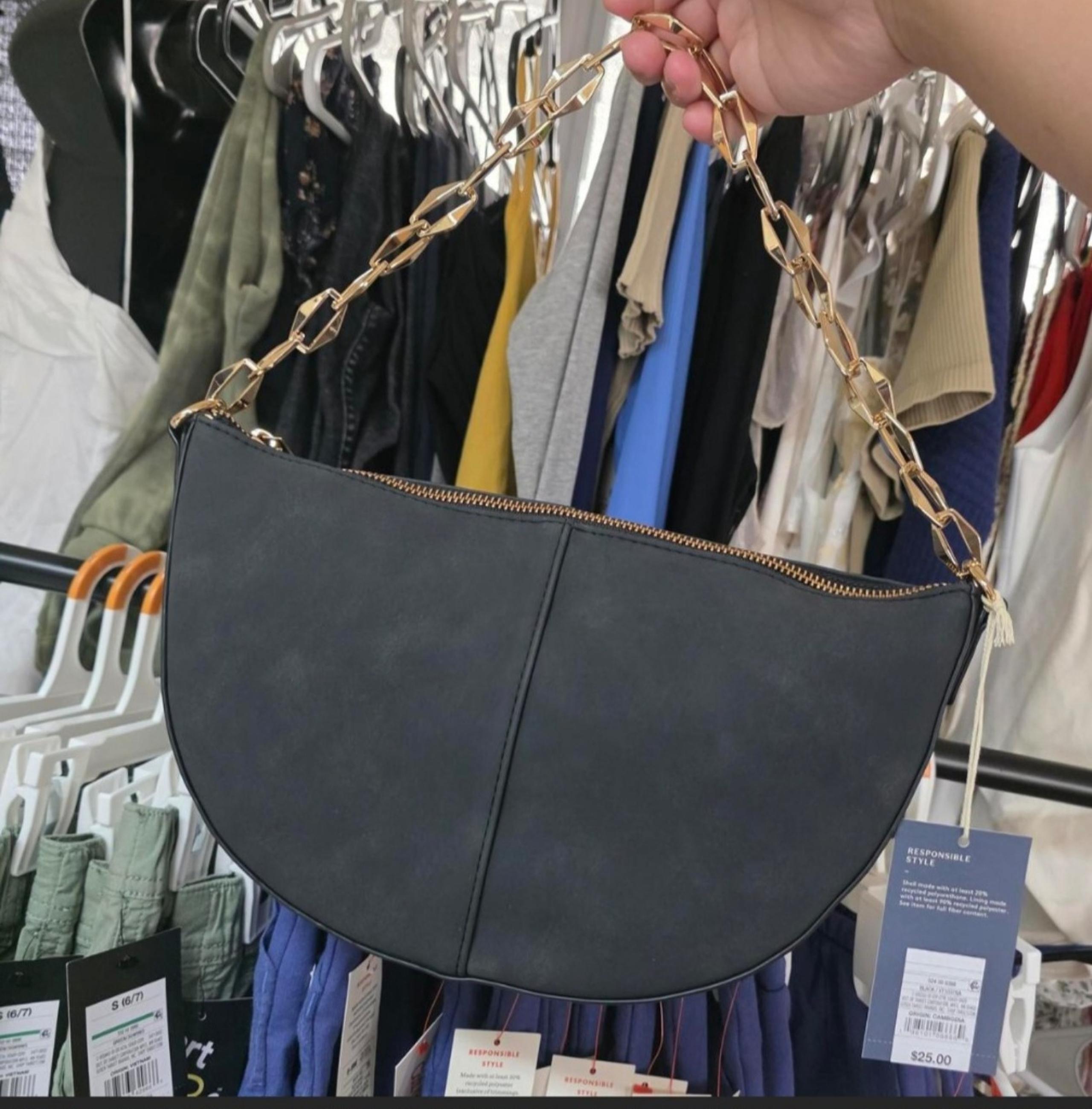 Black shoulder bag with gold chain