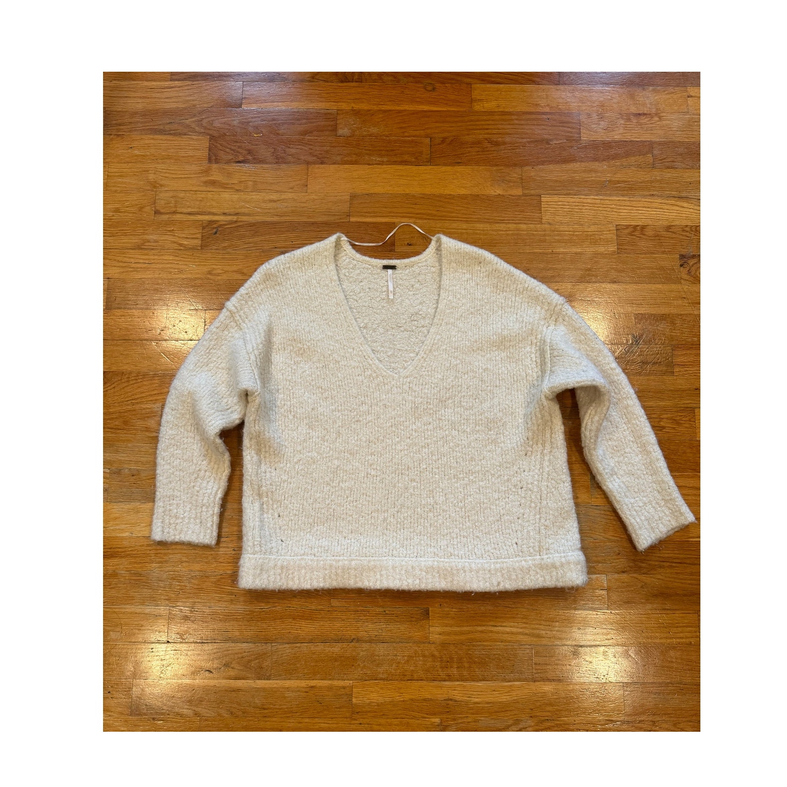Free People cream color v-neck oversize sweater extra small