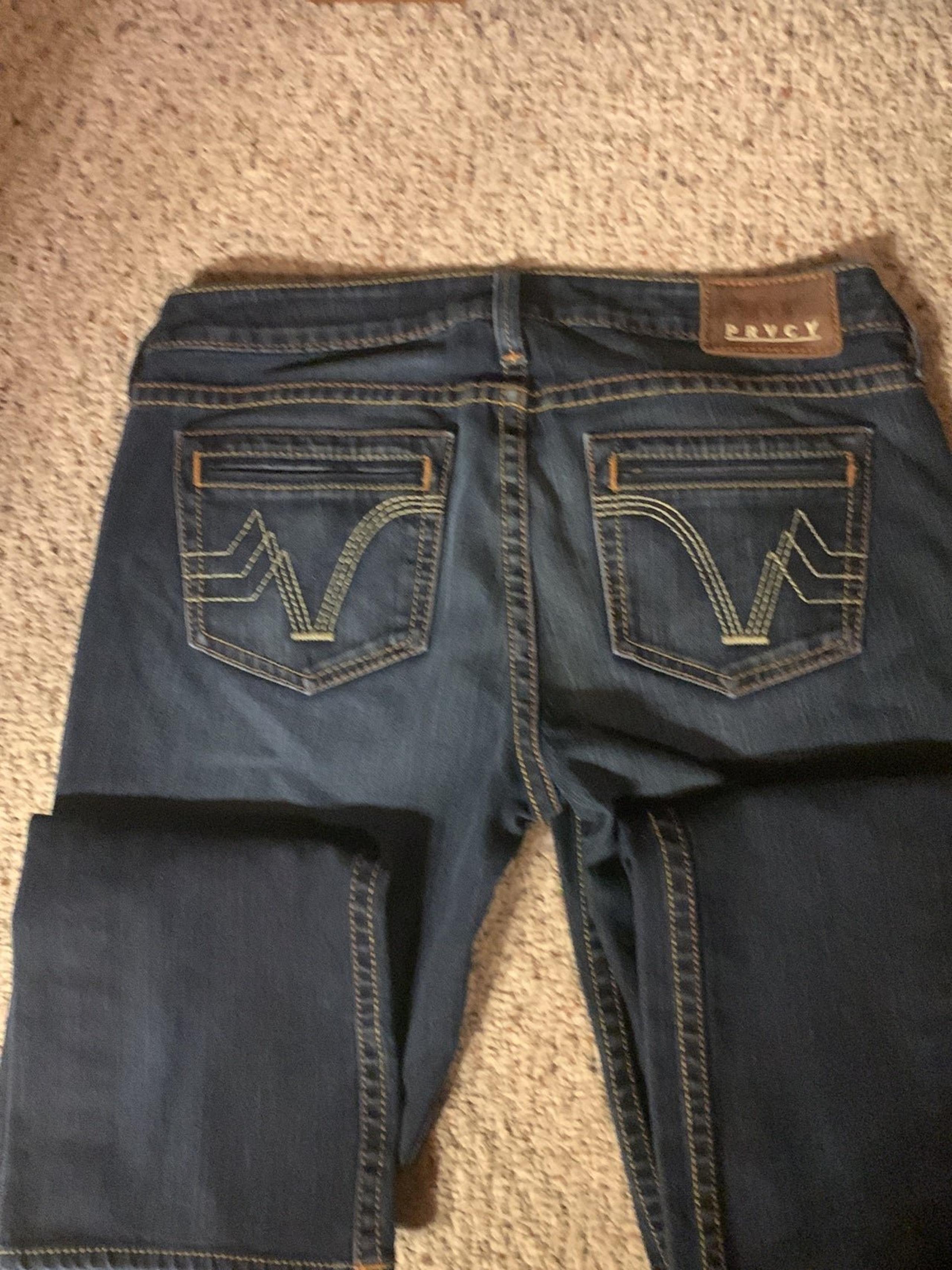 prvcy dark wash boot cut jeans