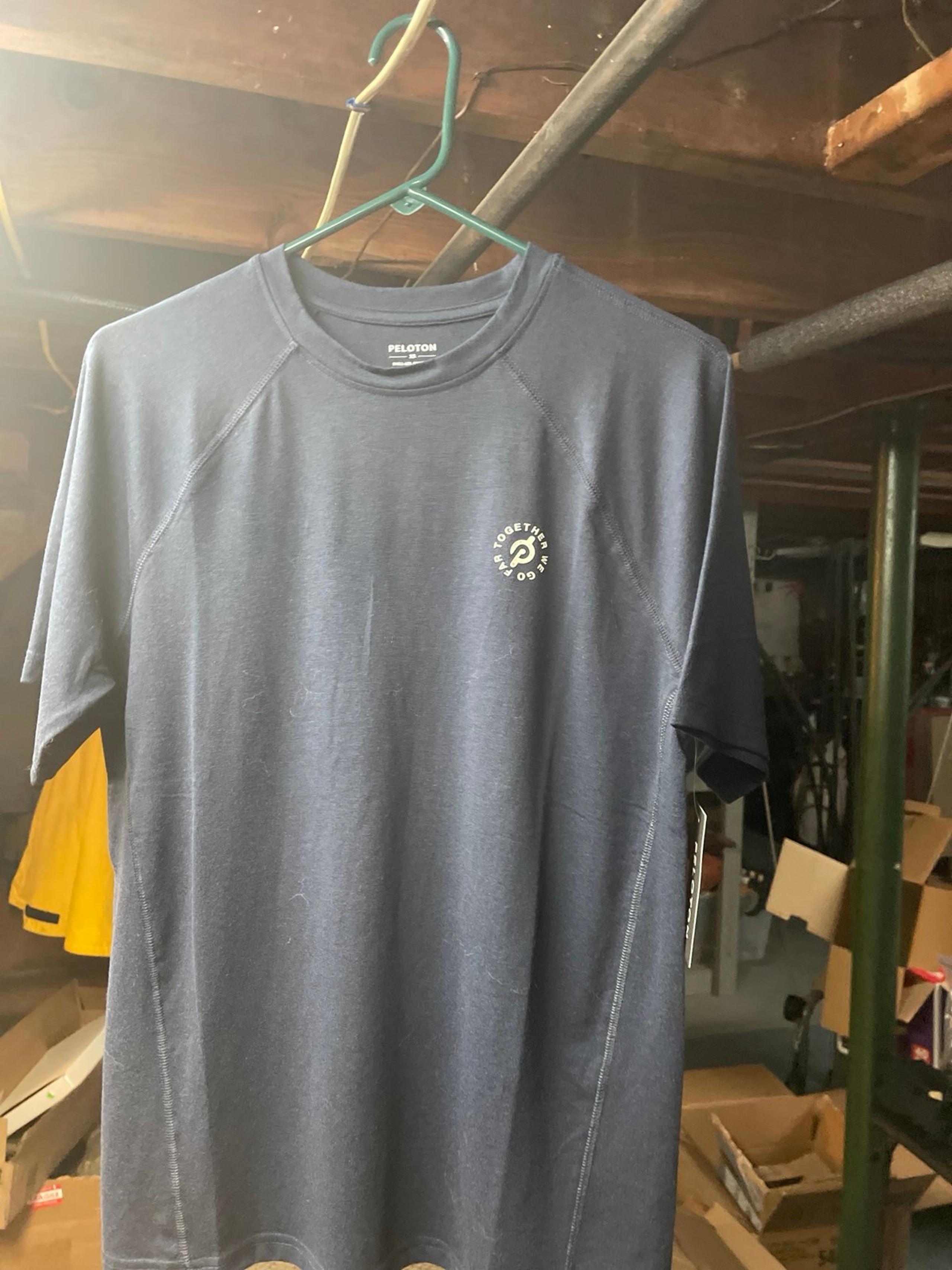 Women’s PELOTON dark blue tee shirt brand new.
