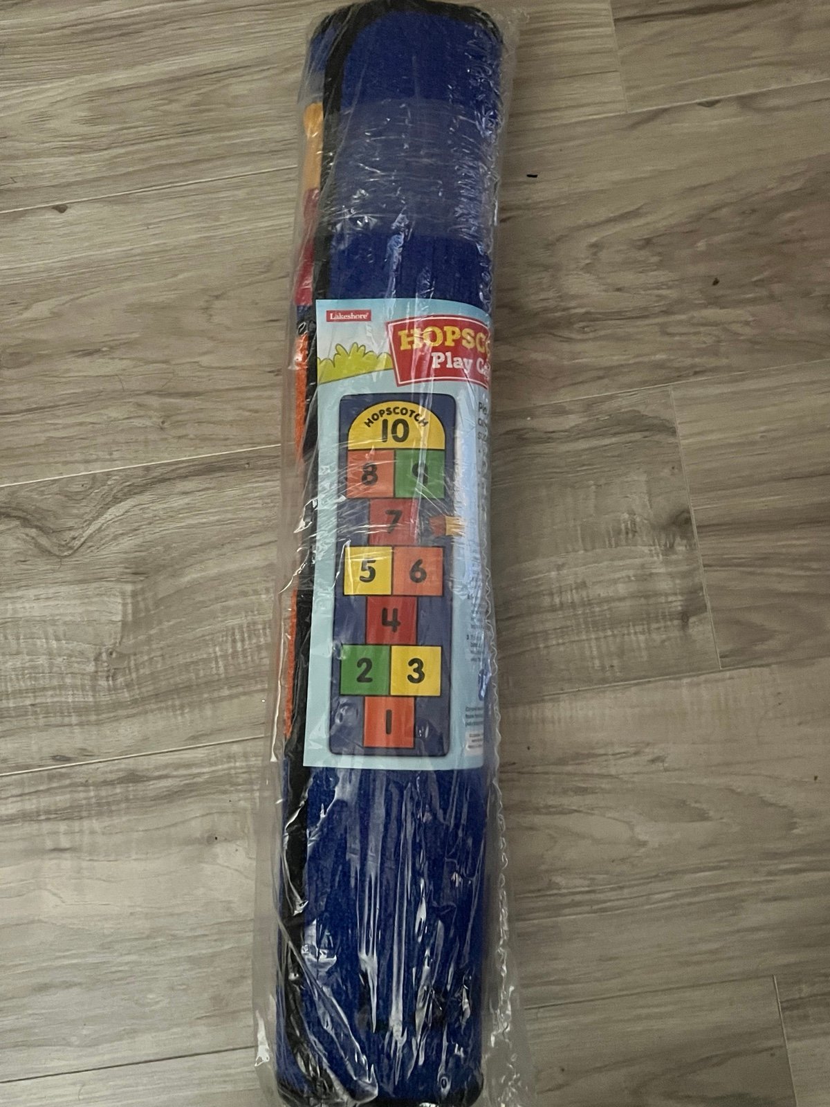 Brand new Hopscotch rug comes with two bean bags bought from lakeshore learning