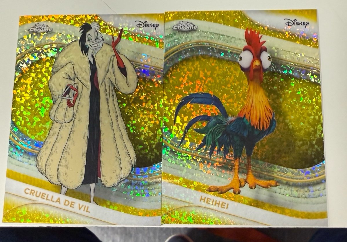 Disney 2025 Topps Chrome Yellow Diamond Hei Hei & Cruella Set