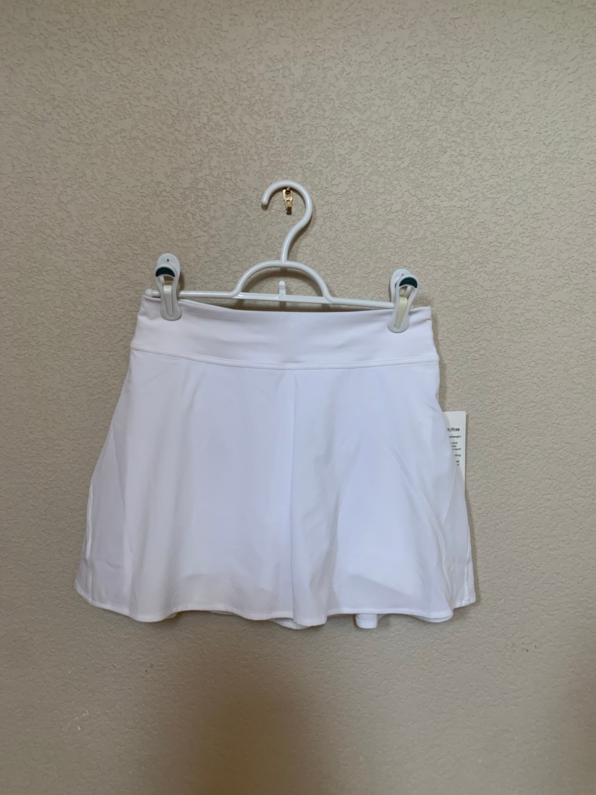 Brand new Lululemon Lightweight high rise tennis skirt. White size 4