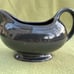 Fiesta Retired Slate Gray 18-1/2 oz Sauceboat and a 9-5/8 oval drip Platter.
