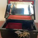 Antique Japanese black lacquer jewelry and music box.