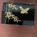 Antique Japanese black lacquer jewelry and music box.