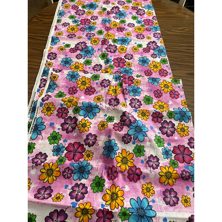 Hancock Fabrics pink with multi colored flowers fabric
