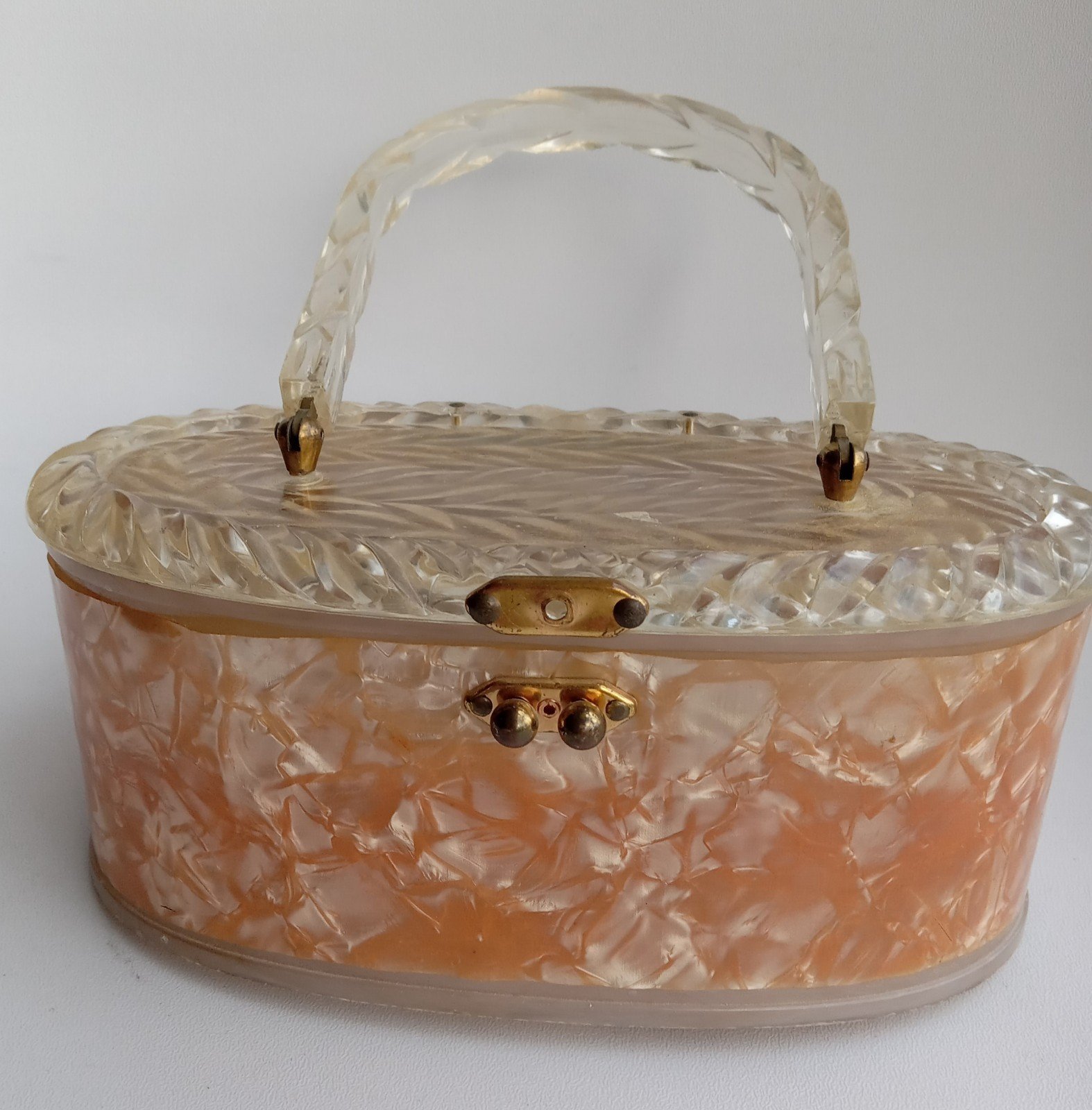 Vintage lucite pink pearlized purse