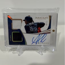 Ozzie Albies On Card Auto and Game Worn Patch /49