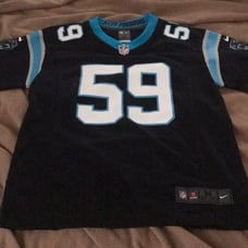 NWT Luke Kuechly Youth Jersey. Size M