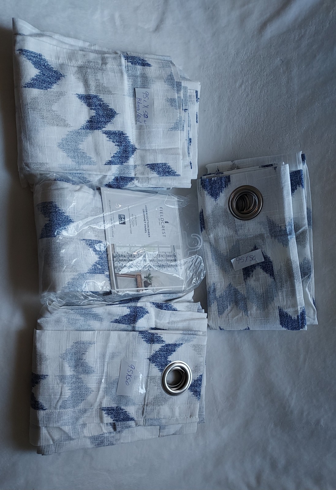Bundle of four sheer curtains
