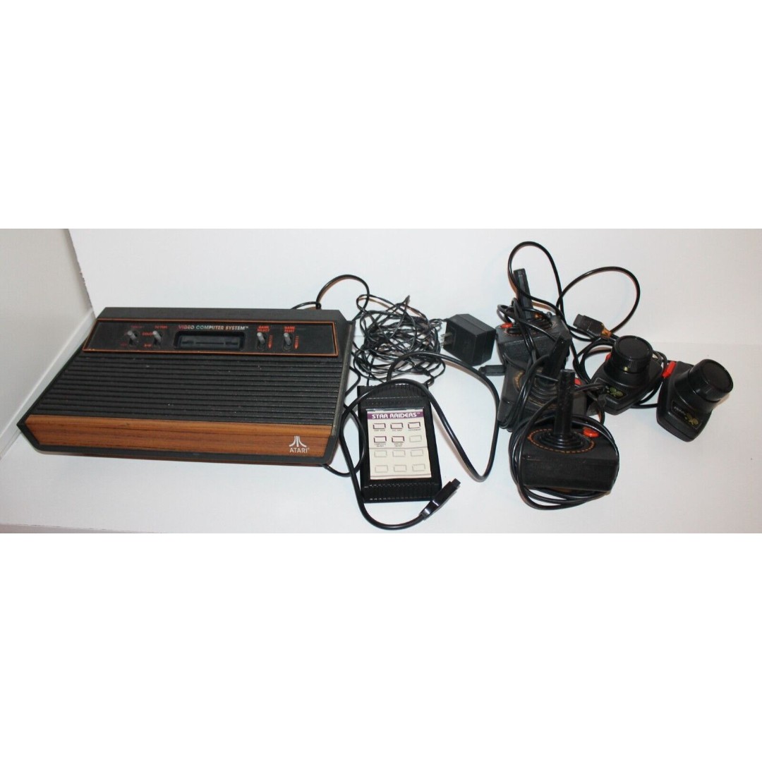 Atari 2600 Console System with Controllers Paddles Wood Grain