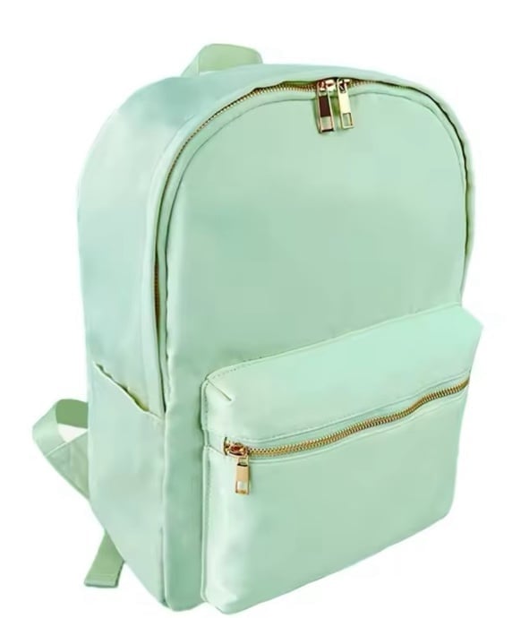 New mint green nylon backpack gold zippers