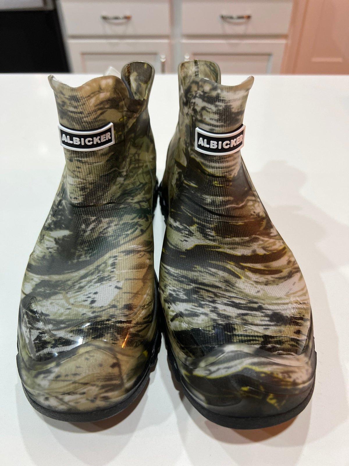 These are Albicker camouflage rubber ankle boots