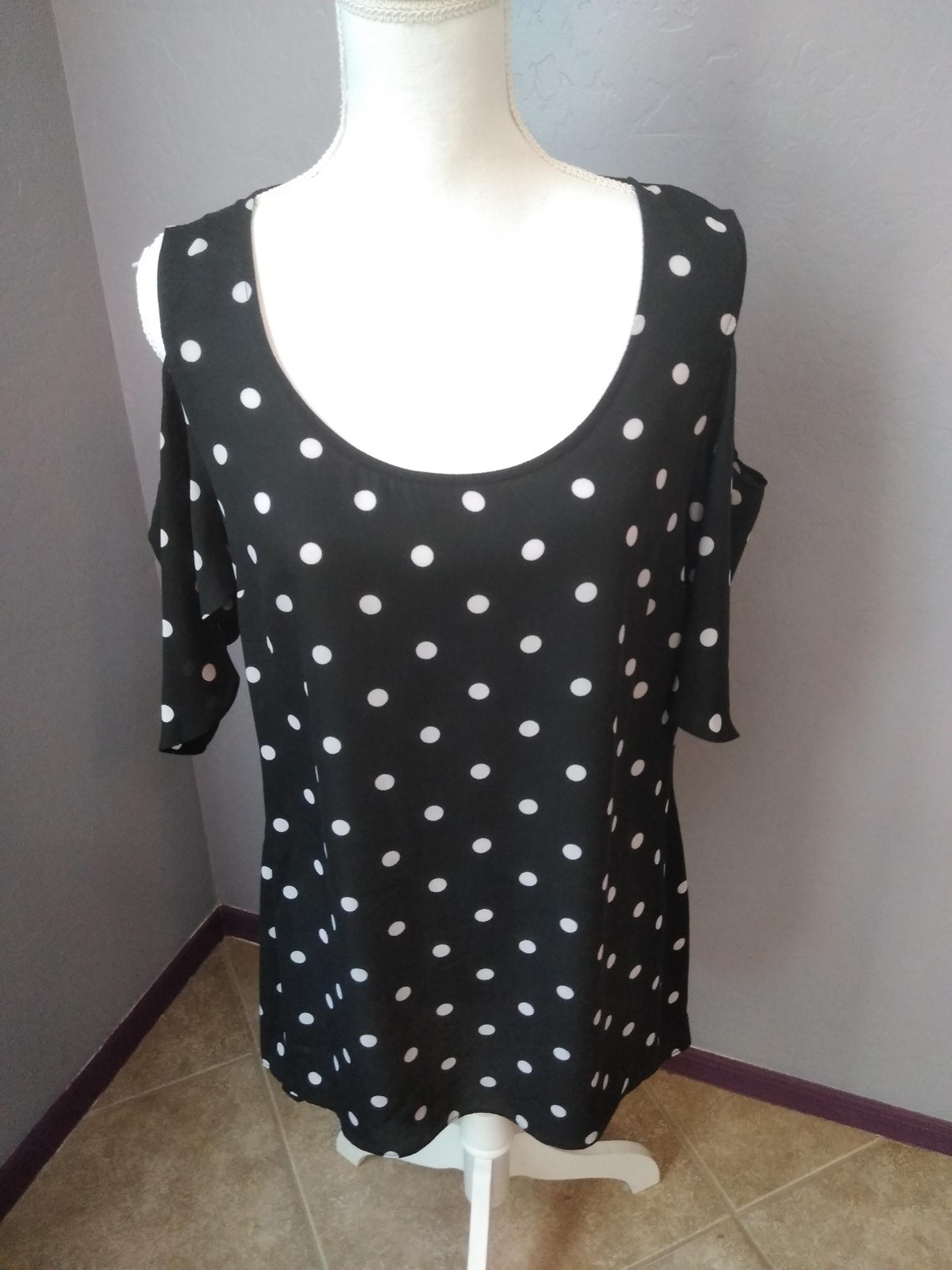 Peter nygard sheer black with white polka dots size small blouse 

100% polyeste