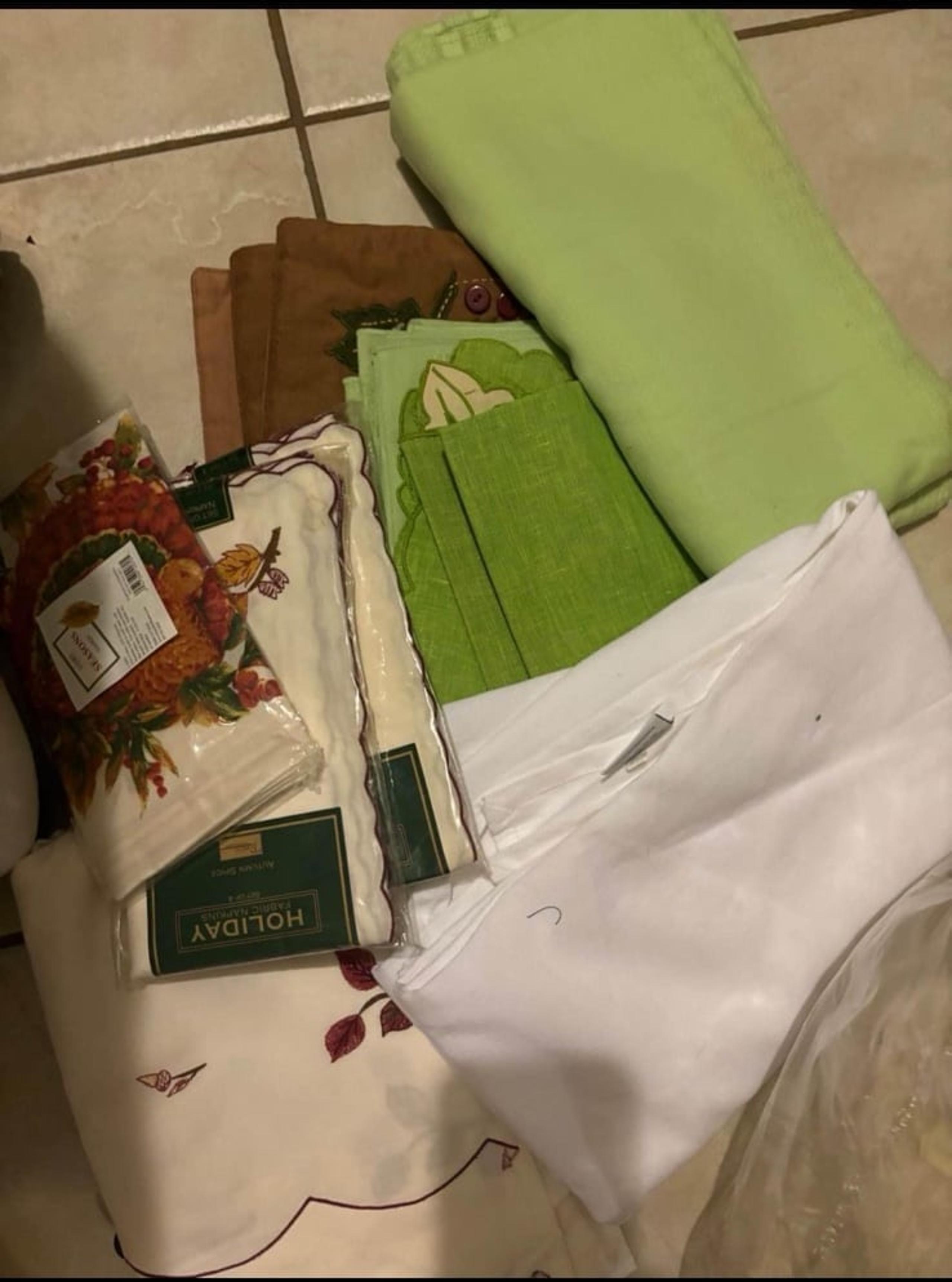 Large Bag of table cloths &etc.
