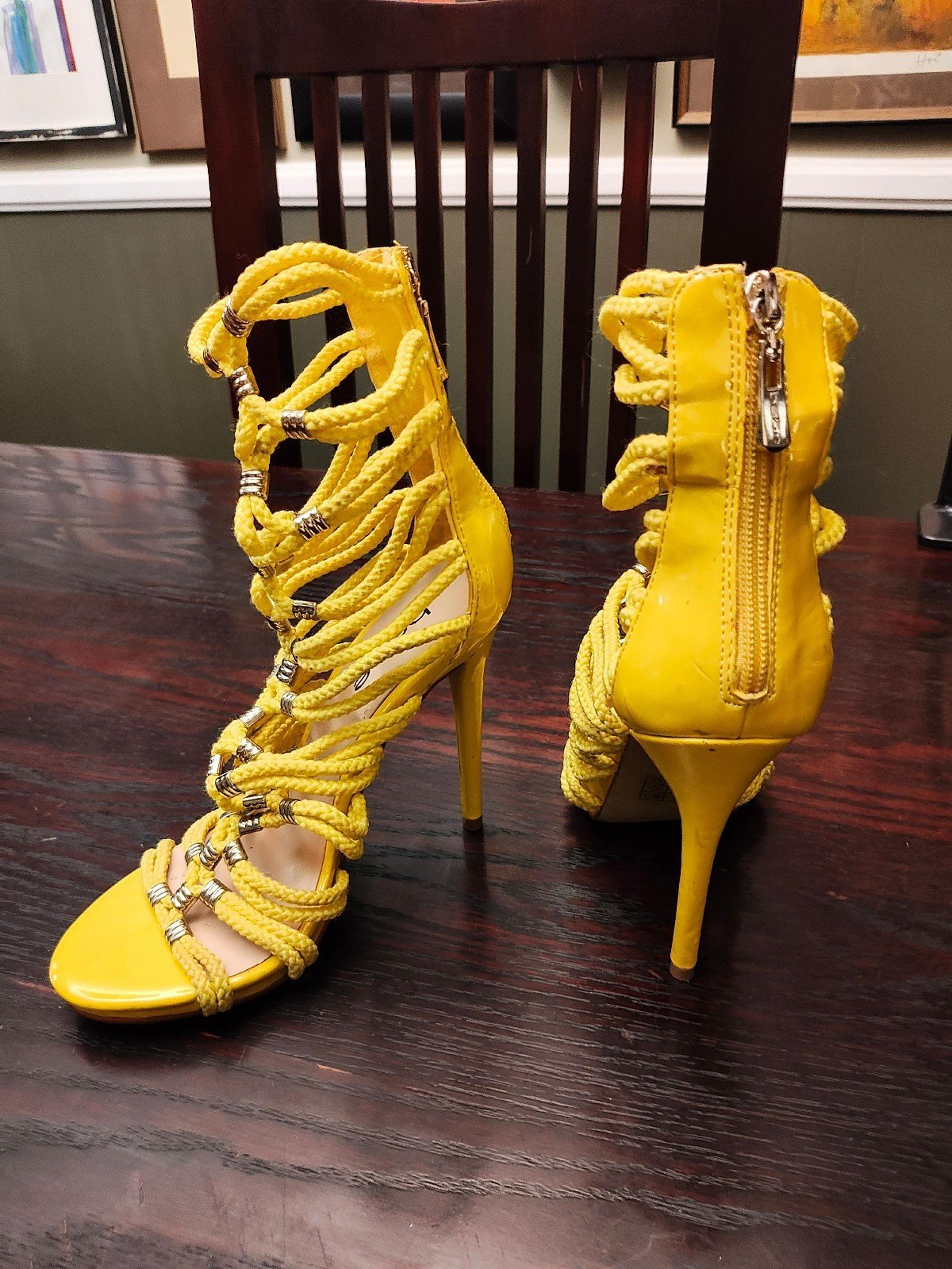 Sexy strappy yellow stilleto sandal heels from Bebe