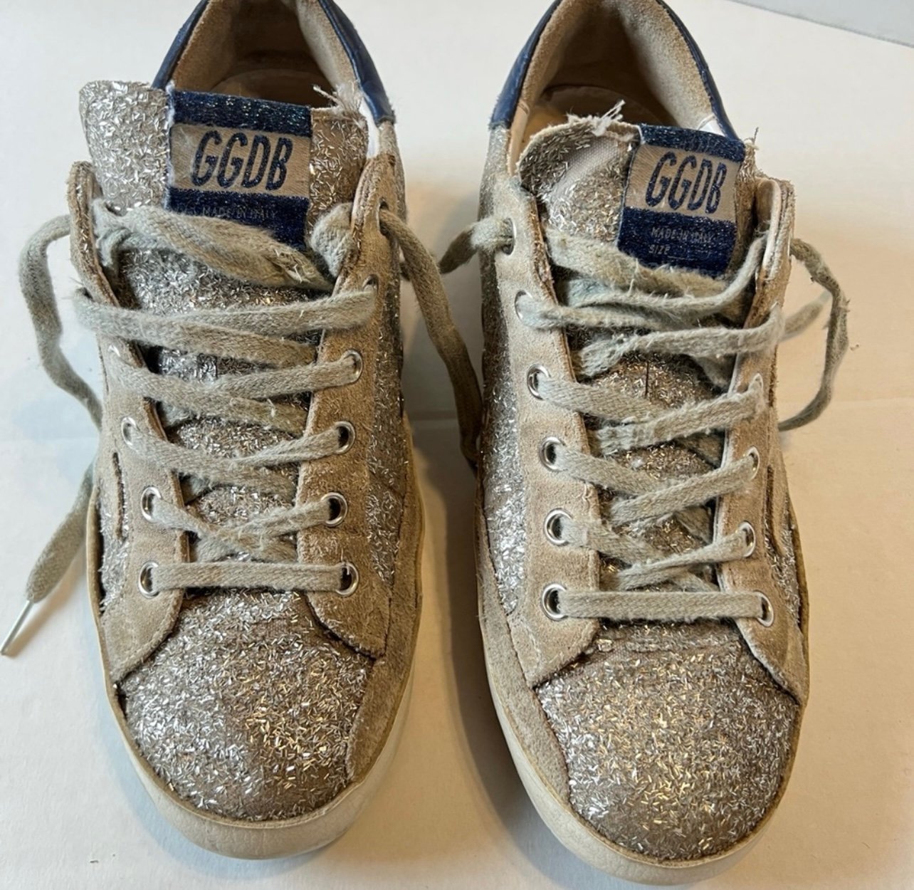 Golden Goose Silver Sneakers/Trainers adorned with a shimmering glittery upper